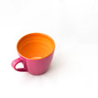 Pink and orange ceramic cup