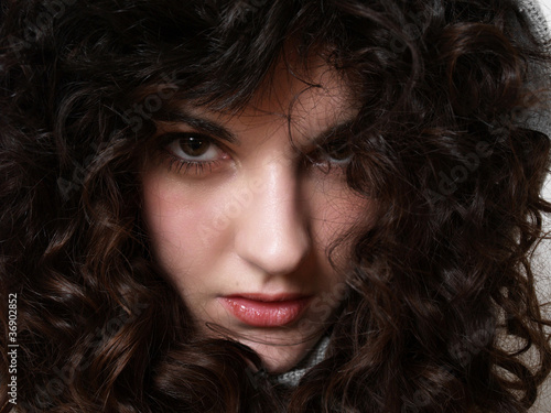 Photo: Face of a beautiful young woman Face of a beautiful young woman