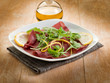 bresaola with arugula salad and olive oil bresaola with arugula salad and olive oil