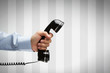 Human hand holding vintage telephone with copy space Human hand holding vintage telephone with copy space