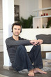 Man listening to music at home