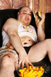 Photo: Eating a hamburger and cheese puffs Eating a hamburger and cheese puffs