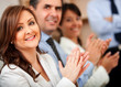 Business woman applauding