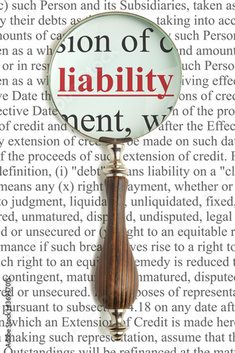 Photo: Magnifying glass and word Liability Magnifying glass and word Liability