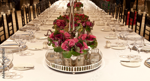 Photo: Elegant candlelight dinner table setting at reception Elegant candlelight dinner table setting at reception