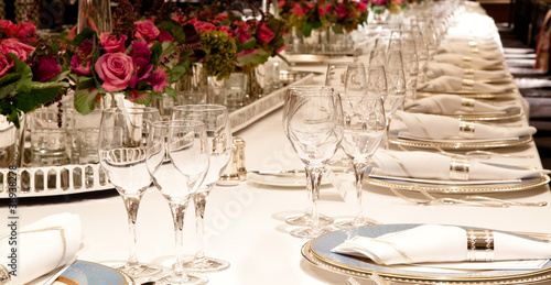 Photo: Elegant candlelight dinner table setting at reception Elegant candlelight dinner table setting at reception