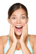 Surprised happy smiling young woman