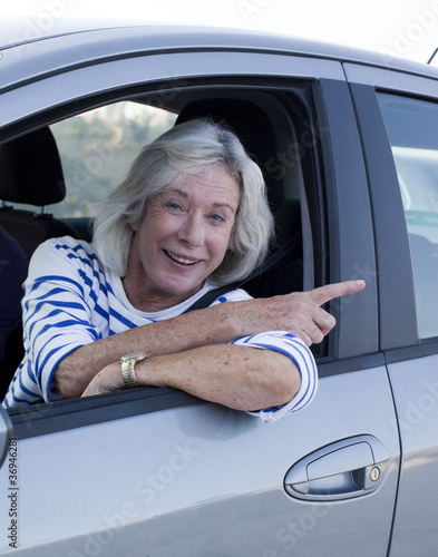 Photo: senior driver looking for her way senior driver looking for her way
