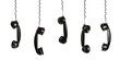 Rotary telephone handsets hanging in the air isolated on white