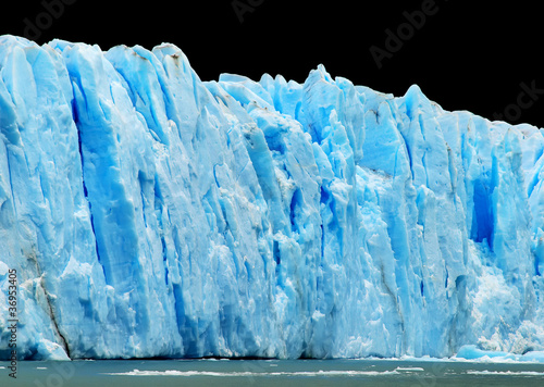 Foto: Blue icebergs isolated on black Blue icebergs isolated on black