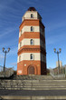 Memorial red brick light tower in Murmansk, Russia Memorial red brick light tower in Murmansk, Russia