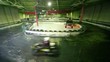 Few carts rides on race track laid in premises under roof