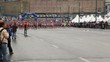 Crowd people run on wet asphalt