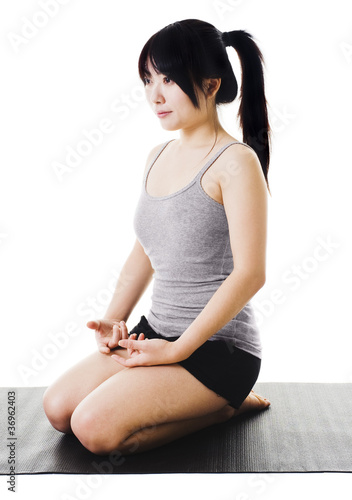 Photo: Chinese woman doing yoga. Chinese woman doing yoga.