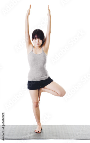 Photo: Chinese woman doing yoga. Chinese woman doing yoga.