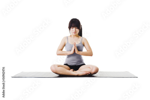 Photo: Chinese woman doing yoga. Chinese woman doing yoga.
