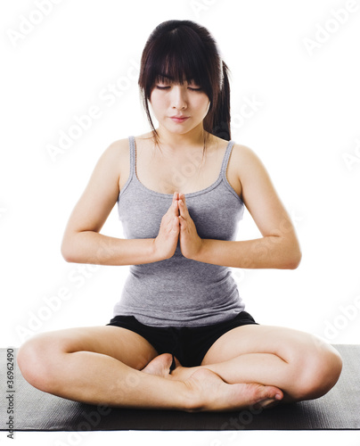 Photo: Chinese woman doing yoga. Chinese woman doing yoga.