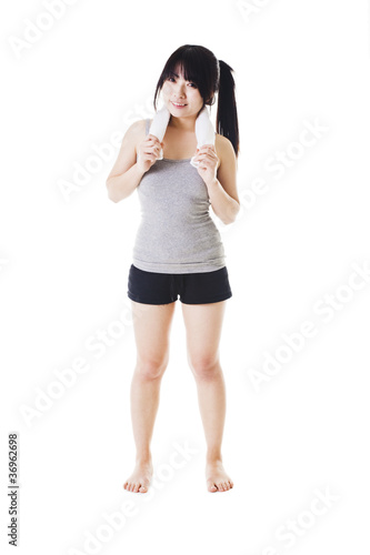 Photo: Chinese girl lifting hand weights. Chinese girl lifting hand weights.