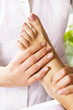 Foot massage in the spa salon Foot massage in the spa salon