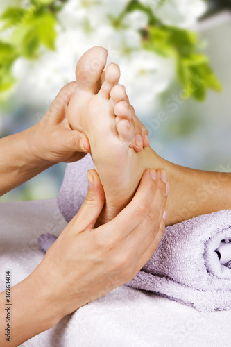 Photo: Foot massage in the spa salon Foot massage in the spa salon