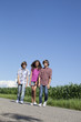 small group of kids on the road