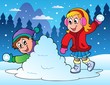 Two kids throwing snow balls