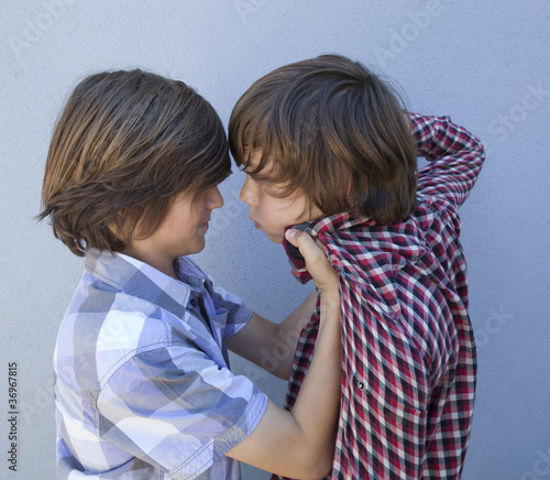 Photo: kids threatening bullying each other kids threatening bullying each other