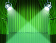Spotlights on green velvet cinema curtains