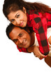 Smiling young Indian man piggybacking his pretty Wife