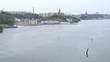 cruise liner pass in front of city