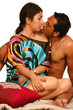 Young man kisses his beautiful girlfriend