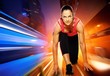 Athletica woman against night city.