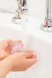 Washing hands.