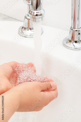 Photo: Washing hands. Washing hands.