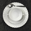 Foto: place setting with soup plate place setting with soup plate