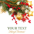 Photo: Christmas background - Xmas tree, gold decoration, red berry iso Christmas background - Xmas tree, gold decoration, red berry iso