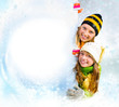 Winter teenage Girls peeking from behind blank sign billboard