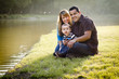 Happy Mixed Race Ethnic Family...
