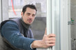 Man installing windows