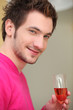 young man drinking wine