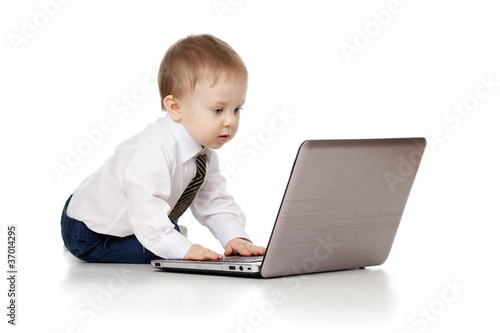 Photo: Child using a laptop Child using a laptop