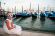 Carnival in Venice - beautiful girl in carnival mask