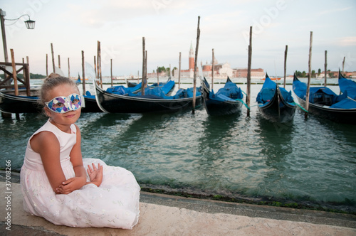 Photo: Carnival in Venice - beautiful girl in carnival mask Carnival in Venice - beautiful girl in carnival mask