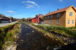 Picturesque Norwegian village with river and smelting houses