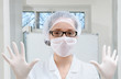 Lab worker demonstrates protective wear
