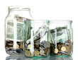 Glass bank for tips with money isolated on white