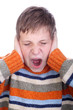 Boy screaming isolated over white background