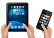 Hands holding tablet computer and mobil telephone.