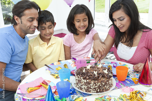 Photo: Asian Indian Family Celebrating Birthday Party Cutting the Cake Asian Indian Family Celebrating Birthday Party Cutting the Cake