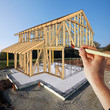 painting the wooden framwork of a new house